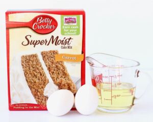 Carrot Cake Cookie Ingredients including eggs, oil, and carrot cake mix.