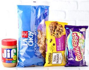 Ingredients for Easter cookies including chow mein noodles, chocolate chips, and peanut butter.