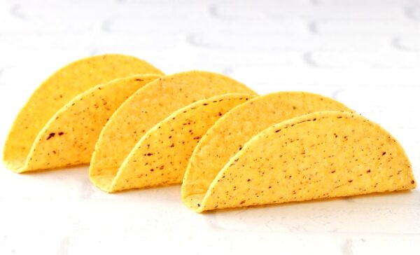 Three crunchy hard taco shells.
