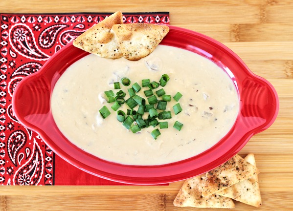 Red bowl of French onion dip.