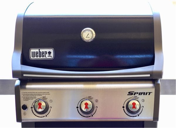 Small, black Weber grill.