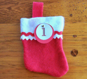 Mini stocking with number one on front.