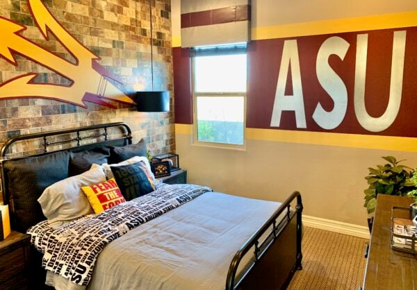 Room decorated with \"ASU\" on the wall.