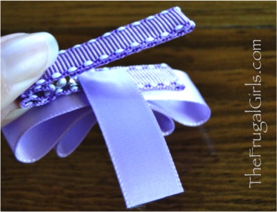 Purple ribbon on a hair clip.