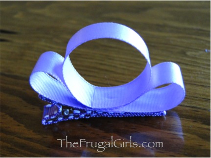 Two loops of lavender ribbon glued on top of hair clip.