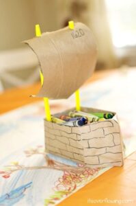 Paper Mayflower with crayons.