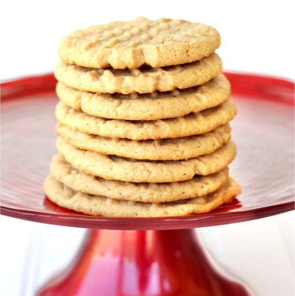 Stack of soft and chewy peanut butter cookies on stand.