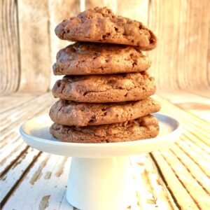 Stack of five chocolate crunch cookies on cookie stand.