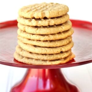 Stack of soft peanut butter cookies on stand.