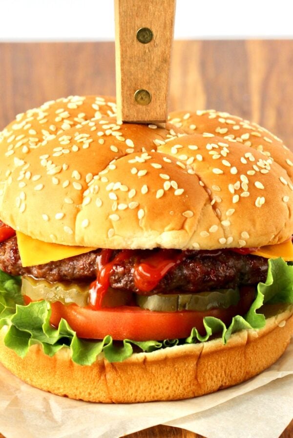 BBQ Burger with cheese, ketchup, pickles, tomato and lettuce.