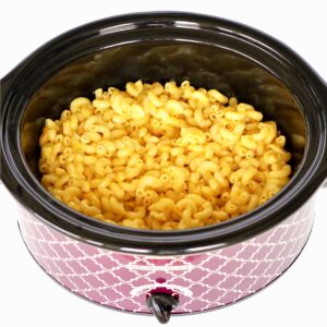 Crock pot filled with creamy macaroni and cheese.