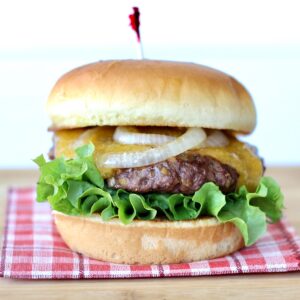 Ranch burger with lettuce, melted cheese and grilled onions.