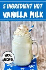 Hot Vanilla Milk in mason jar mug with whip cream and cinnamon on top.
