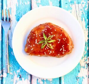 Honey Garlic pork chop with plate.