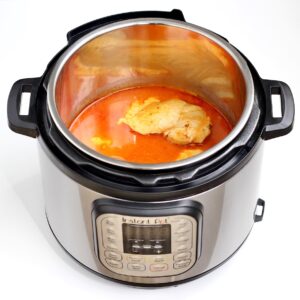 Chicken with buffalo ranch sauce in instant pot.