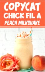 Peach milkshake in mason jar with whip cream and sprinkles.