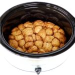 Monkey bread made with biscuits in crockpot.