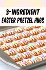 Easter pretzel hugs with M&Ms on baking sheet.
