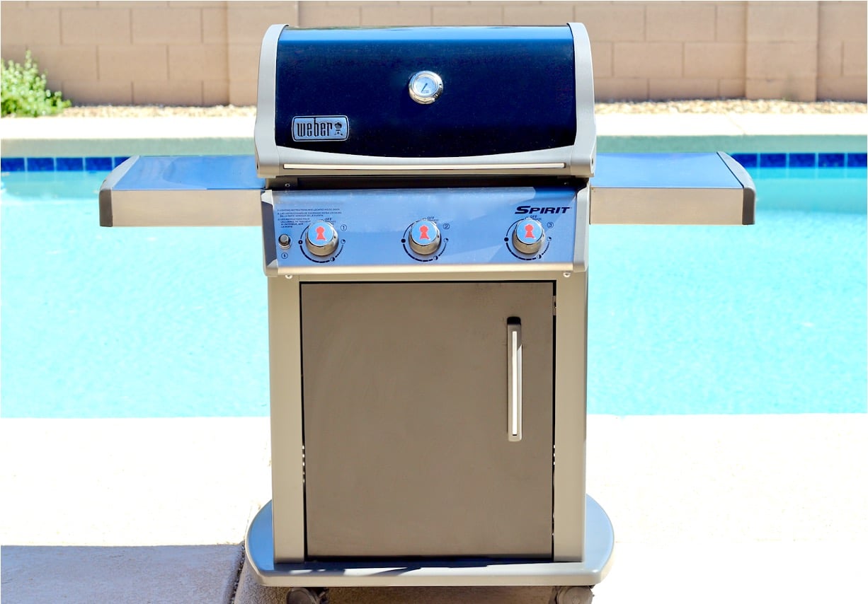 Grill outside by pool.