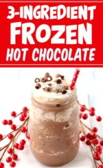 Frozen hot chocolate in mason jar with straw and whip cream.