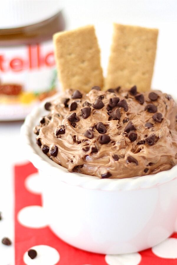 Nutella Dip in small bowl with mini chocolate chips on top.