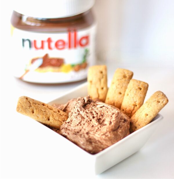 Nutella Dip in small dish with graham cracker cookies.