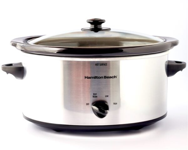 Crock Pot with Baked Potatoes inside.