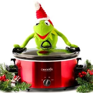 Frog with crockpot and Christmas decor.
