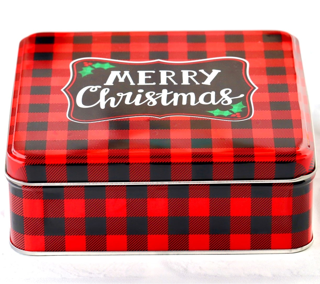 Christmas cookie tin with lid on.
